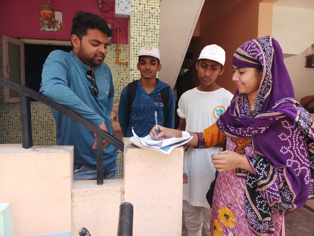 REDS team conducting a community survey